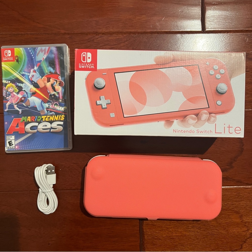 Nintendo Switch Lite Coral with Mario Tennis Aces